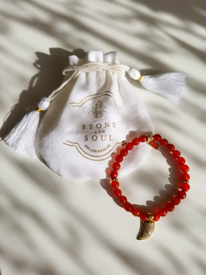 <img src="Carnelian_Bracelet_charm-2.jpg" alt= "stone and soul bracelet gift pouch">